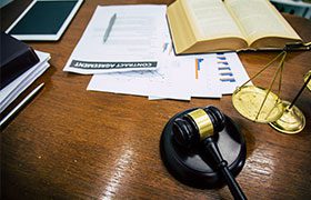 Legal counsel explaining the adjustment of status process to a client in Dallas