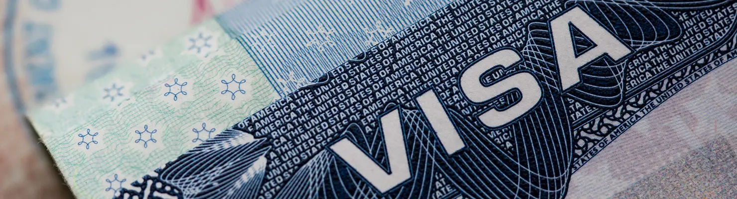 American Family Visa printed on a Latino immigrant's passport