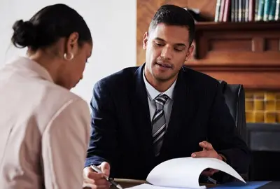 Lawyer advising his client on how to deal with a deportation order