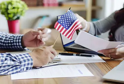 Attorney and client discussing difficulties in the US Citizenship Process in 2025