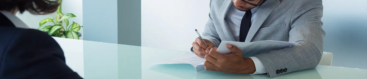 Attorney reviews requirements for his client's 2025 Citizenship Process in Dallas