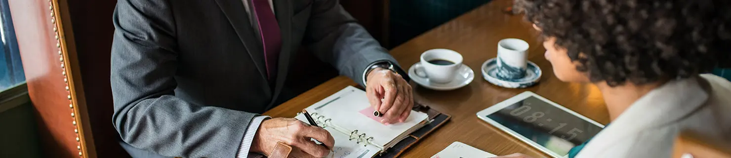 Lawyer showing legal options for his client with a deportation order in the United States