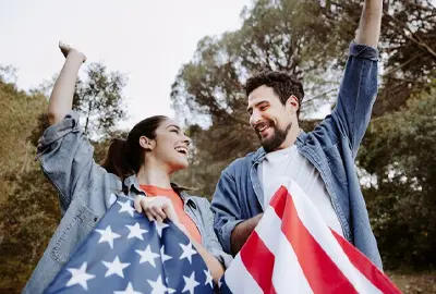 Happy couple after obtaining a Green Card in the United States