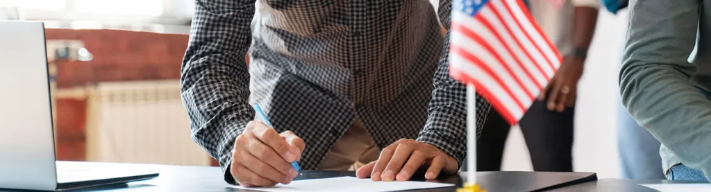 Person reviewing key aspects of the denaturalization process for naturalized citizens