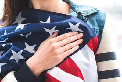 Woman who was admitted as an asylum seeker in the United States