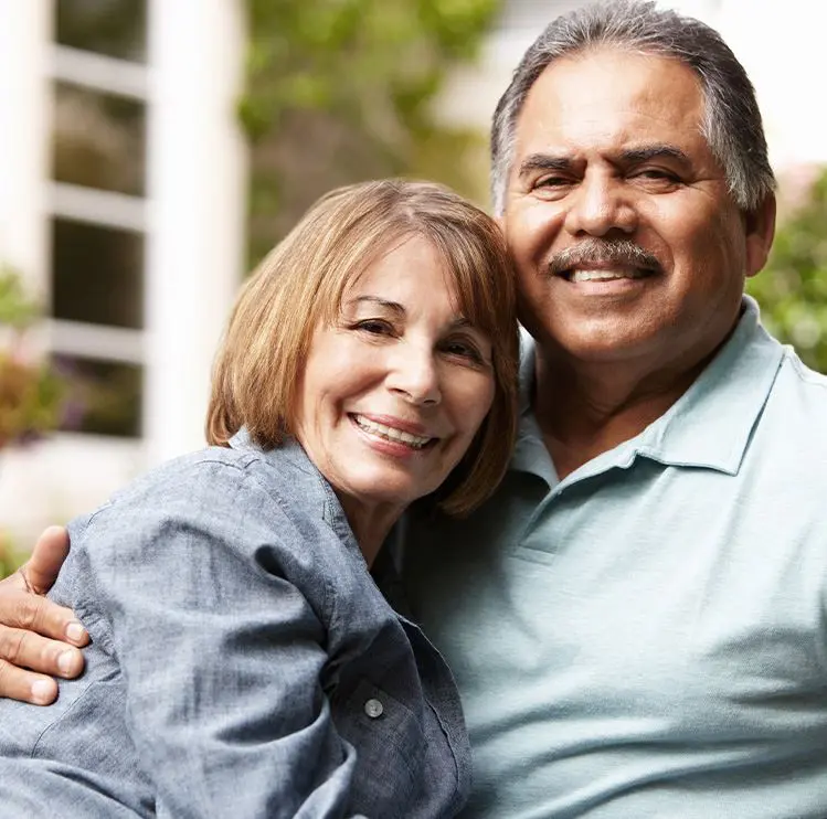 Latino immigrant couple happy after obtaining their immigration status in Dallas