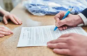Immigration attorney assisting with documentation for family immigration petitions in Dallas