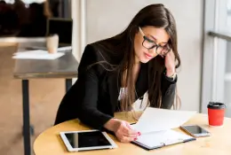 Legal advisor of immigration law firm reviewing documents of applicants for Employment Opportunity in Immigration Law at Perdomo Dorsett Immigration Law in Dallas