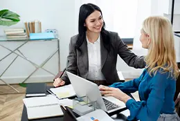 Legal professional at immigration law firm discussing Immigration Law Employment Opportunity to an attorney in Dallas