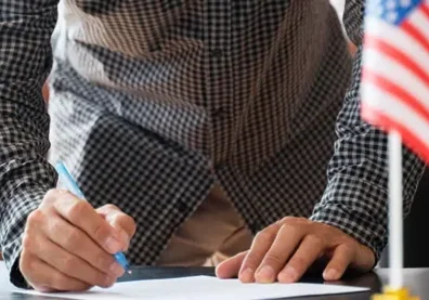 Person reviewing key aspects of the denaturalization process for naturalized citizens